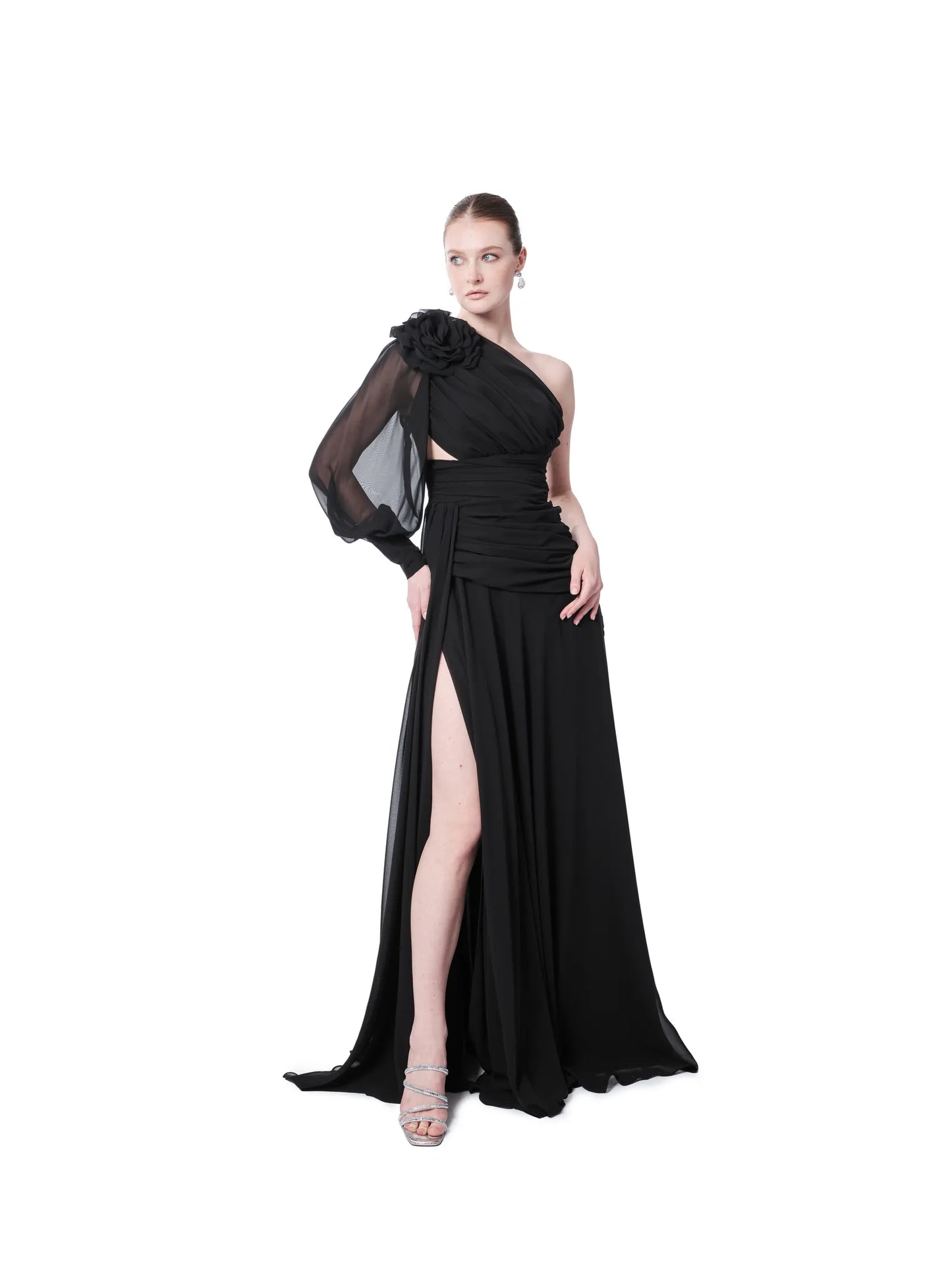 Pink one shoulder evening gown with floral detail, puffed sleeve and high slit