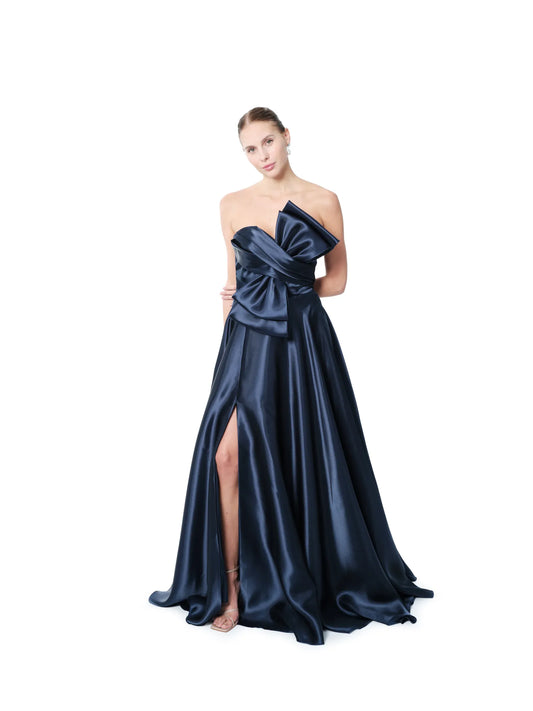 Strapless long evening gown with bow accent and high slit