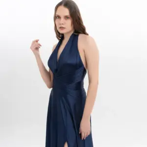 Halter neck evening dress metallic pleated