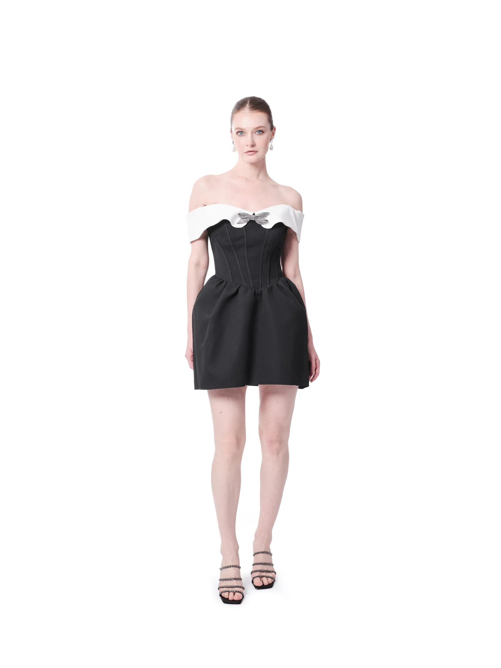 Off shoulder cocktail dress with bow detail and pleated two-tone design